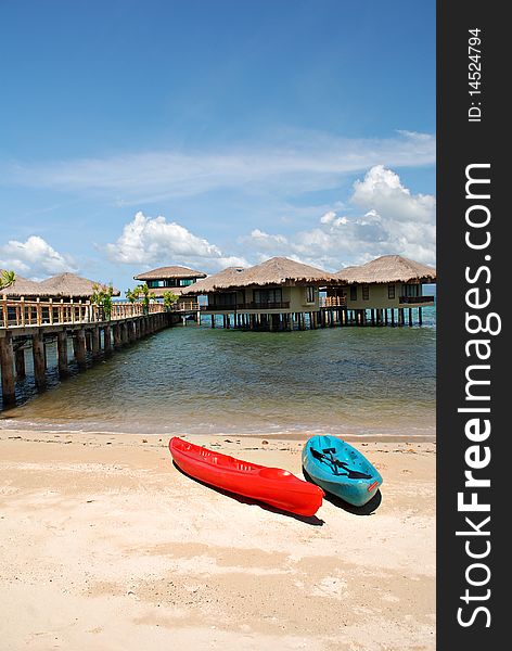 Red and Blue Kayaks on a Beach