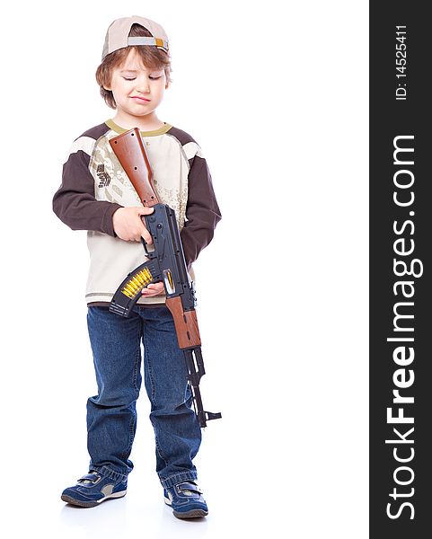 Portrait of little boy with automatic weapon (Kalashnikov). Isolated on white background