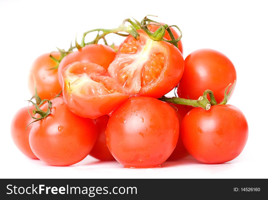 Fresh tomatoes over white