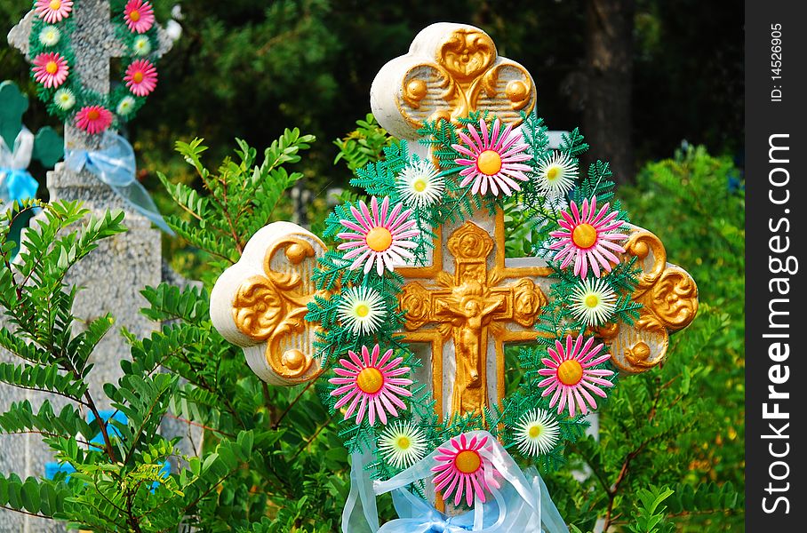 Old cross on churchyard in Ukraine