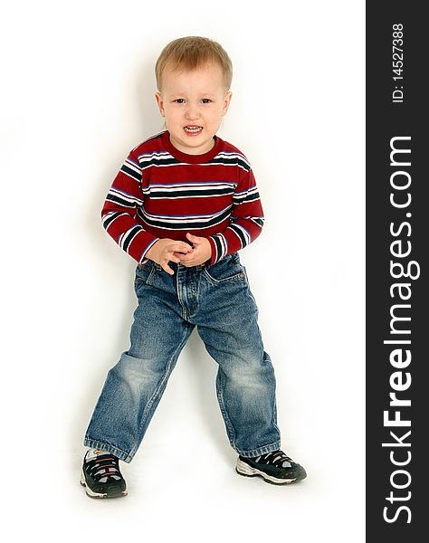 Little dissatisfied  boy on white background. Little dissatisfied  boy on white background