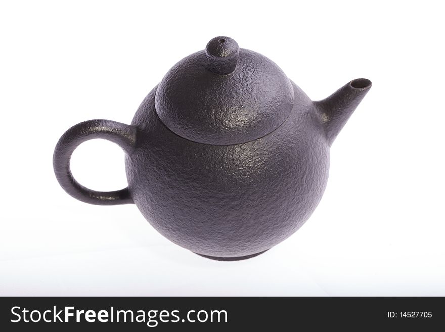 Chinese handmade teapot isolated on white background.