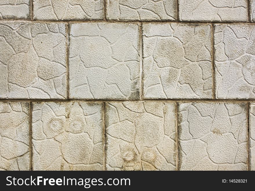 Grey brick wall as background