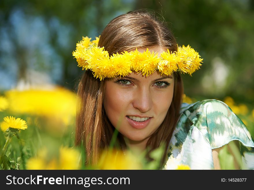 The girl with a wreath on a head