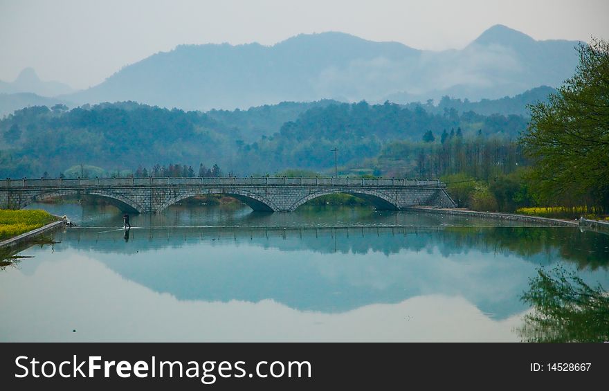 Bridge over the Xixi river, Hongcun, Anhui Province, China. Hongcun is a UNESCO World Heritage Site. Bridge over the Xixi river, Hongcun, Anhui Province, China. Hongcun is a UNESCO World Heritage Site.