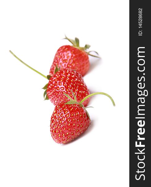 Three strawberry isolated on white background