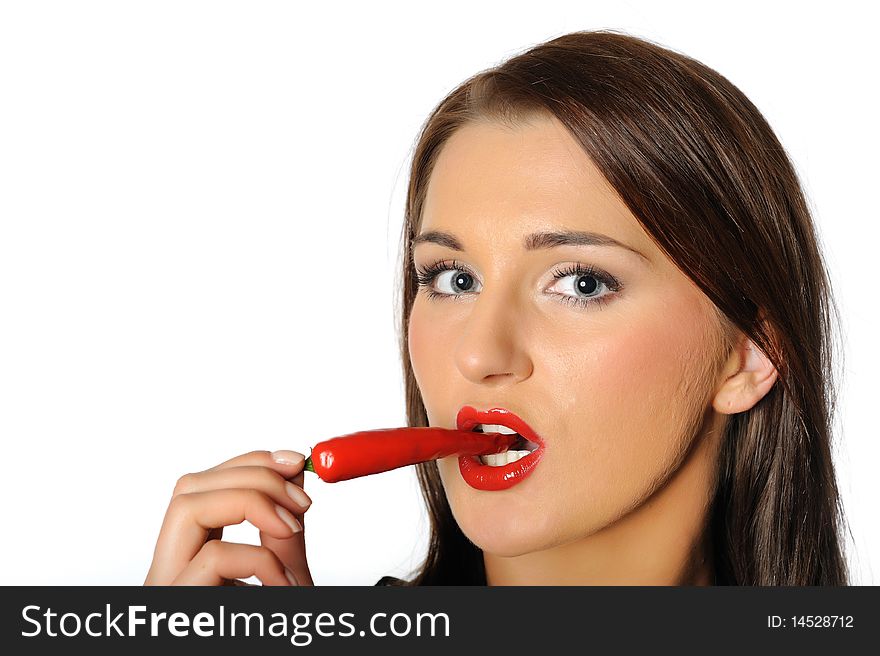 Beautiful sexy woman with red hot chilli pepper