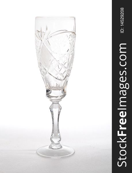 Single empty wineglass isolated on white