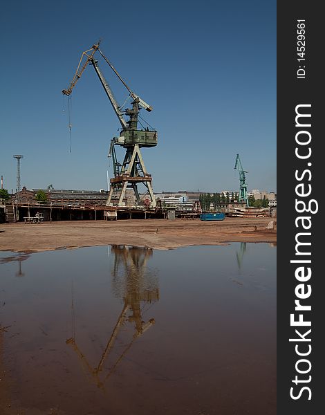 Wery high old crane in shipyard