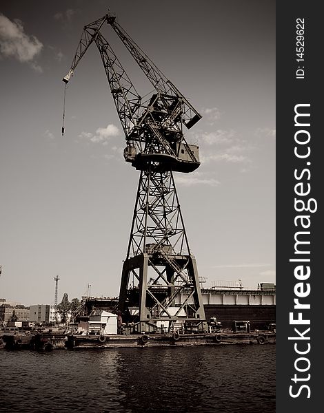 Wery high old crane in shipyard