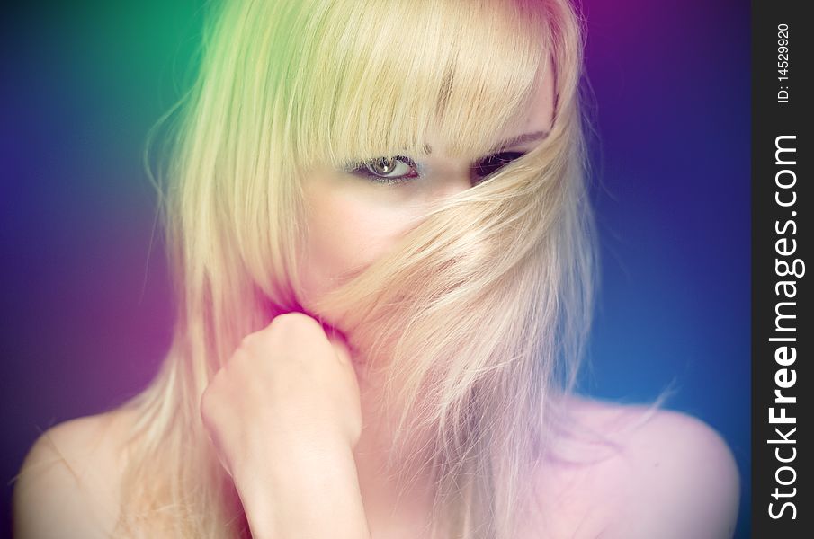 Blond in studio in colors