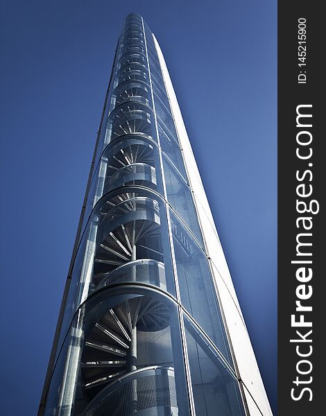 Staircase of a lift bridge in Bordeaux, stairs, upstairs, steps, floor, architecture, glass, modern, urban, france, french, tower, height, high, aluminum, blue, sky, city, design. Staircase of a lift bridge in Bordeaux, stairs, upstairs, steps, floor, architecture, glass, modern, urban, france, french, tower, height, high, aluminum, blue, sky, city, design