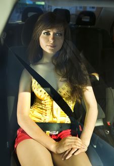 Woman Fastened By Seat Belt Royalty Free Stock Photography
