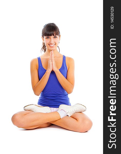 Beautiful young woman sits in the lotus position. Beautiful young woman sits in the lotus position