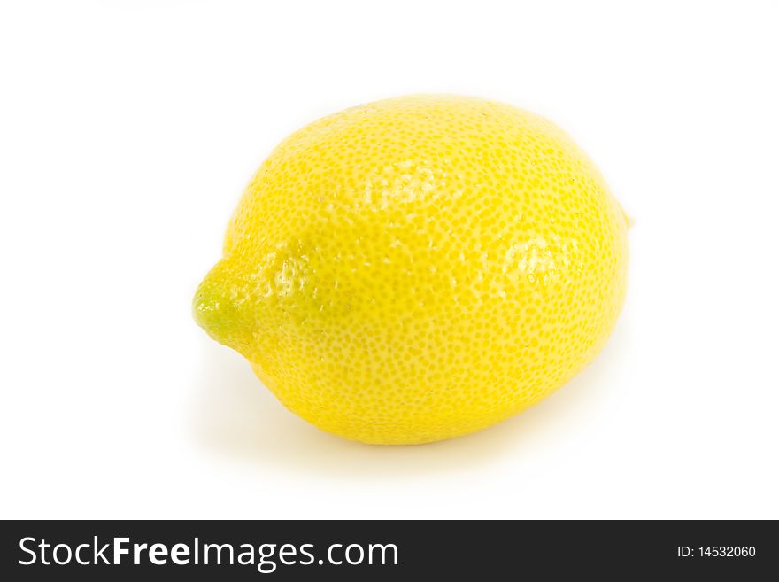 Whole fresh ripe organic yellow lemon isolated on a white background. Whole fresh ripe organic yellow lemon isolated on a white background