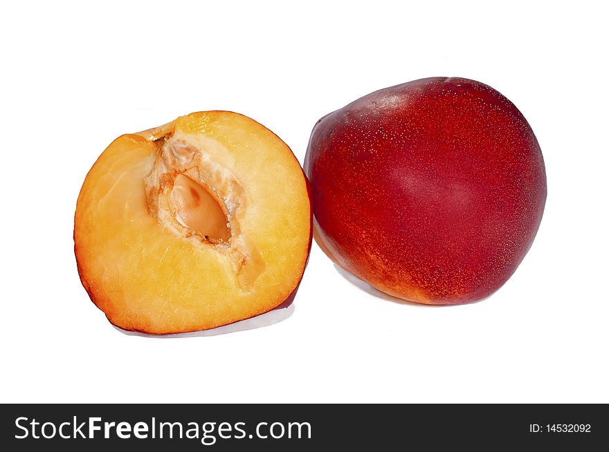 Red peaches on white background