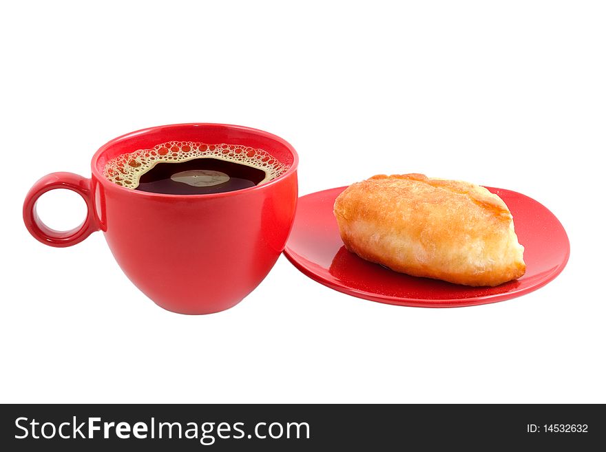 Cup of coffee and patty are photographed on the white background