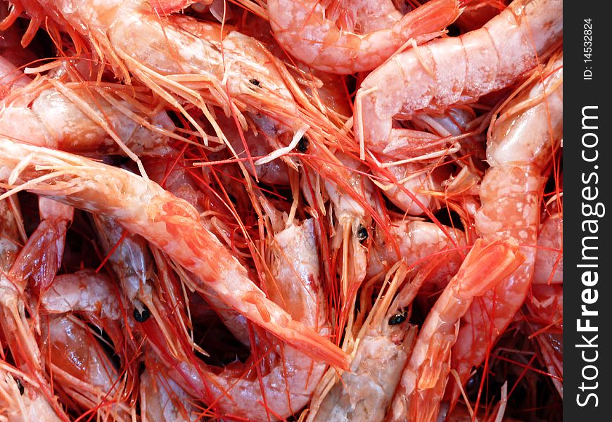 Fresh shrimps closeup background at the local market