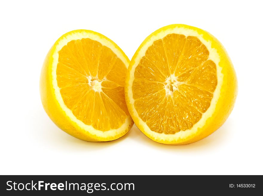 Fresh Juicy Orange Sliced in half isolated on a white background. Fresh Juicy Orange Sliced in half isolated on a white background