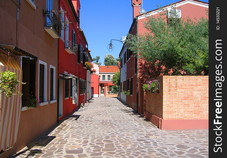 Burano color street, photo taken on July 21th,2008 in Burano, Italy. Burano color street, photo taken on July 21th,2008 in Burano, Italy