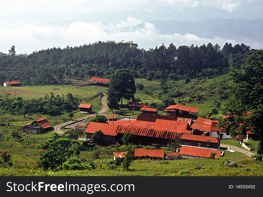 Farm with red roofs in the mountains of Guatemala. Farm with red roofs in the mountains of Guatemala