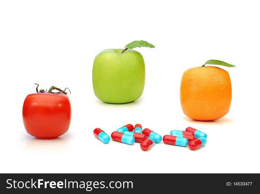 Square shaped fruit and vitamin pills. Square shaped fruit and vitamin pills