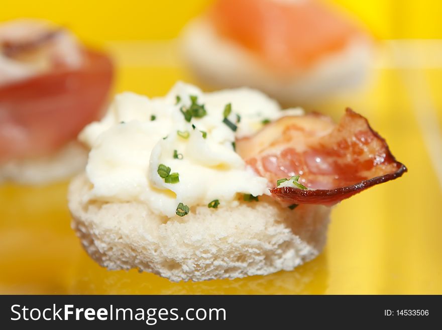 Festively arranged meat products in an plentyful ambient.