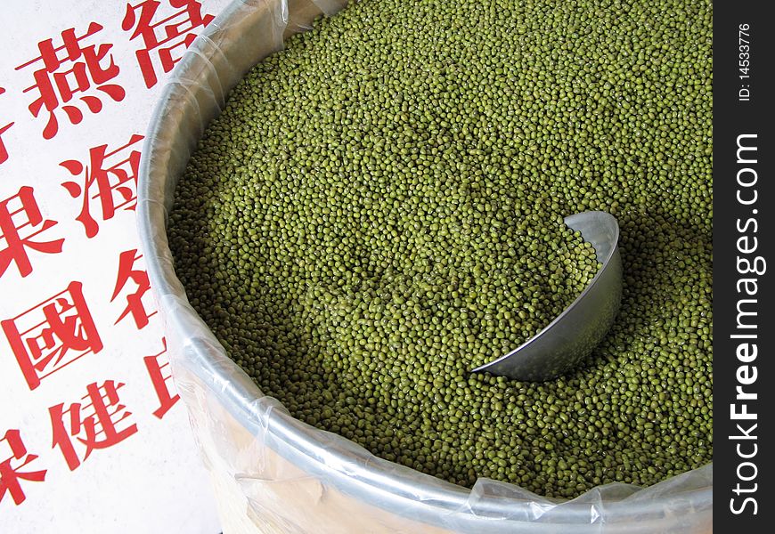 Green peas in a large container