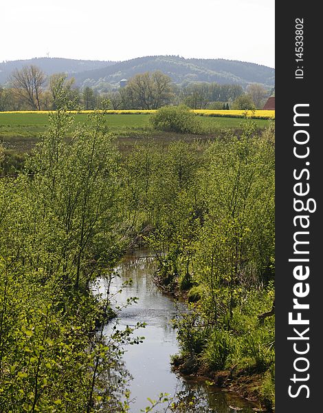 Little brook in Georgsmarienhuette, Lower Saxony, Germany, Europe. Little brook in Georgsmarienhuette, Lower Saxony, Germany, Europe