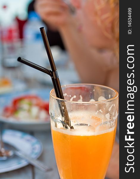 Orange juice with straws black