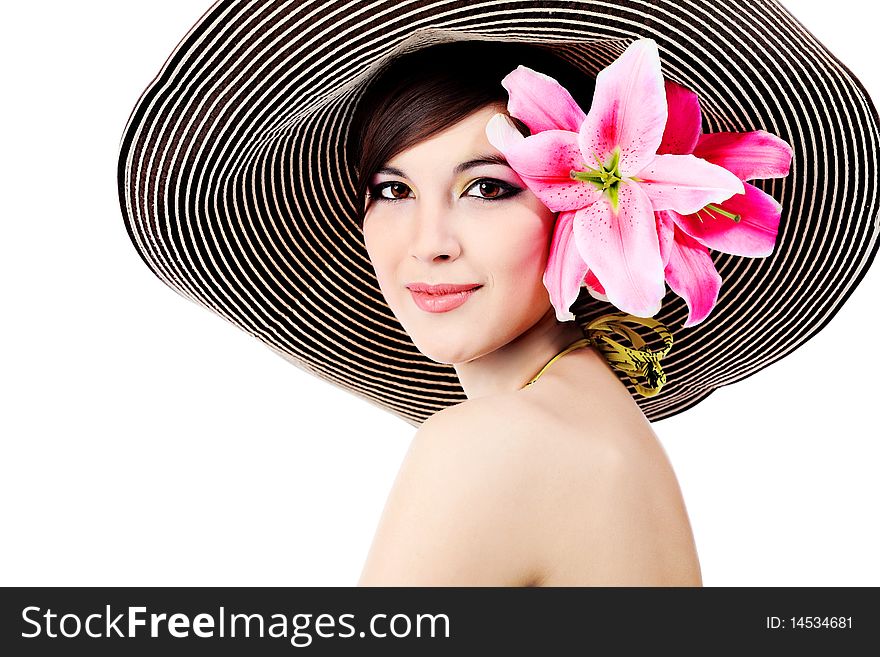 Shot of a young beautiful woman in elegant hat with a lily flowers. Isolated over white background. Shot of a young beautiful woman in elegant hat with a lily flowers. Isolated over white background.
