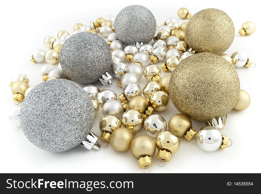 Full pack of silver and golden christmas balls on white. Full pack of silver and golden christmas balls on white