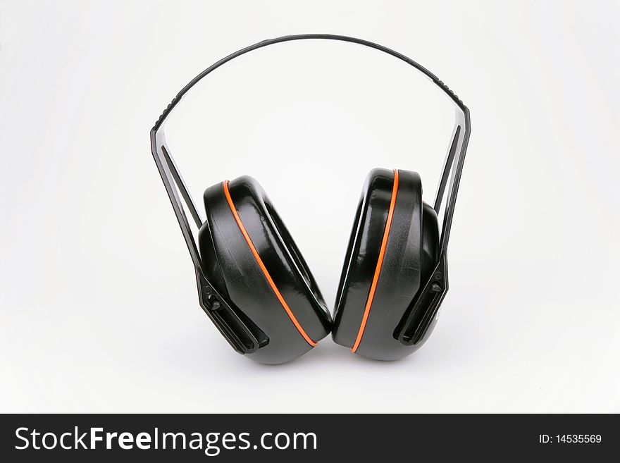 Ear-phones of black colour on a white background. Ear-phones of black colour on a white background