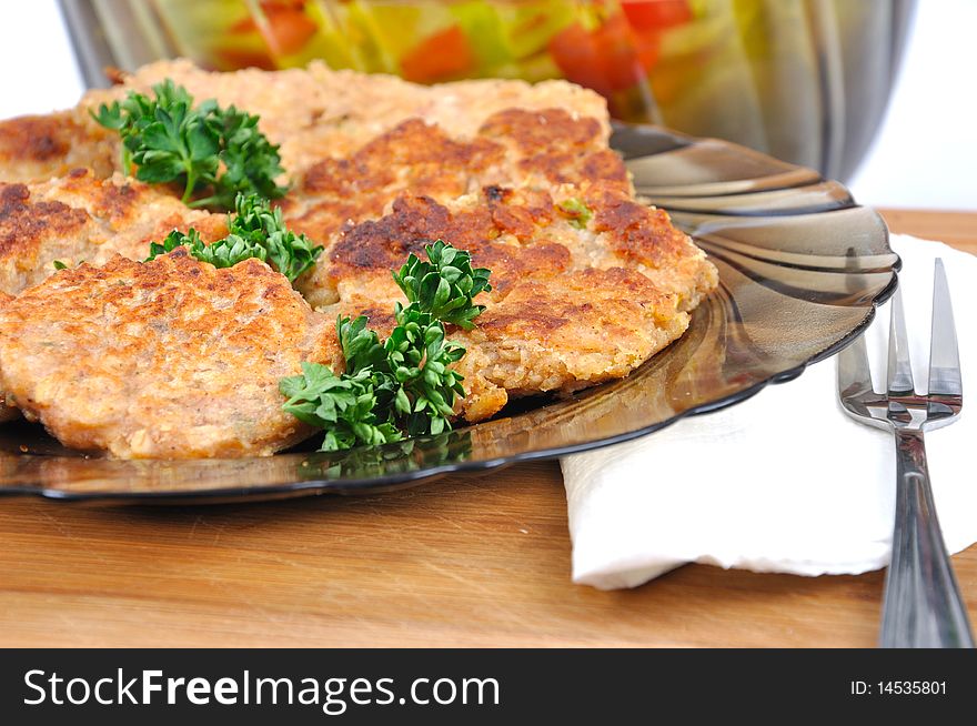 Oat flake pancake with vegetable salad and fork. Oat flake pancake with vegetable salad and fork