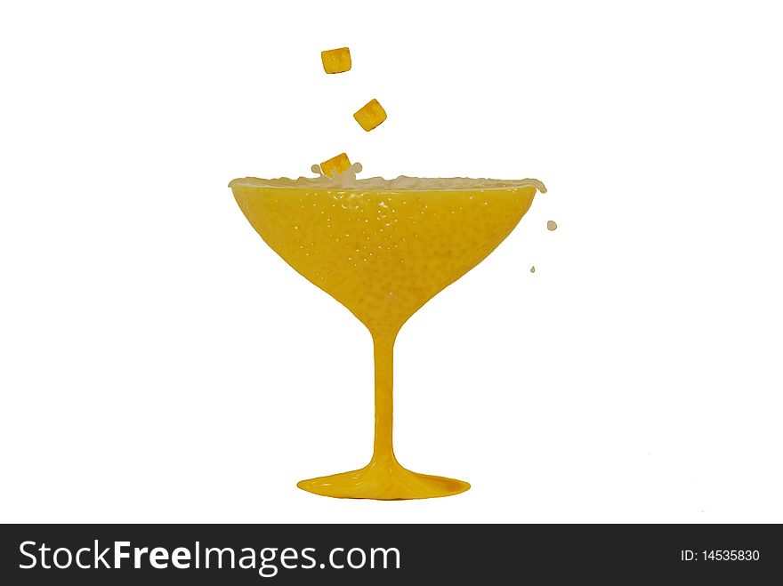 Styled lemon glass with lemons ice cubes and drops of juice