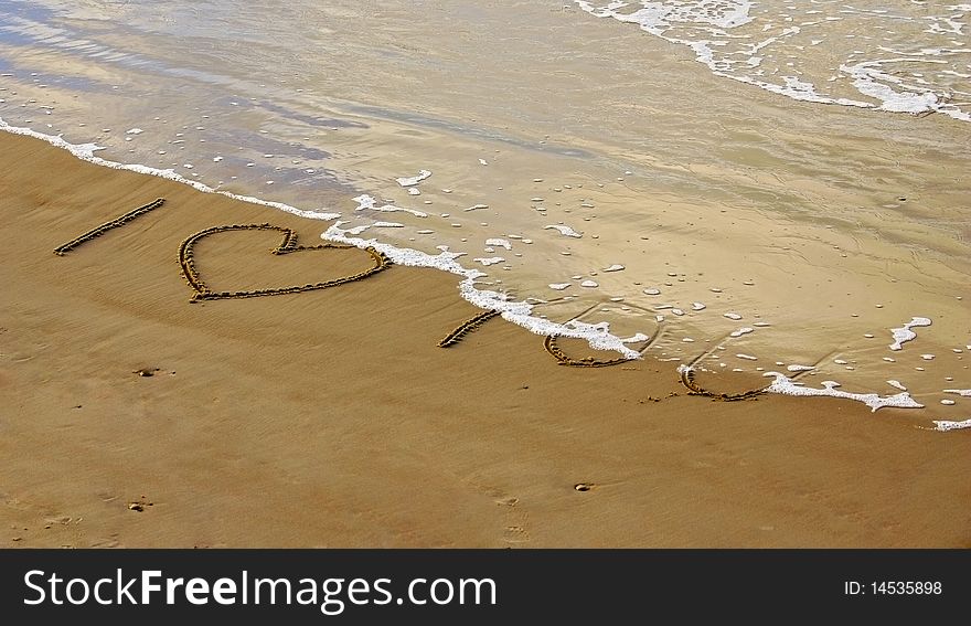 I you love an inscription on sea coast. I you love an inscription on sea coast