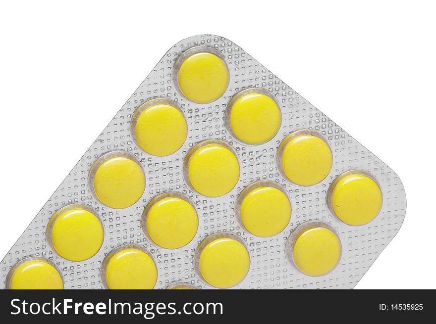 Macro of pills isolated on white background