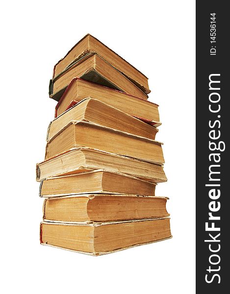 Pile of old books on isolated white background