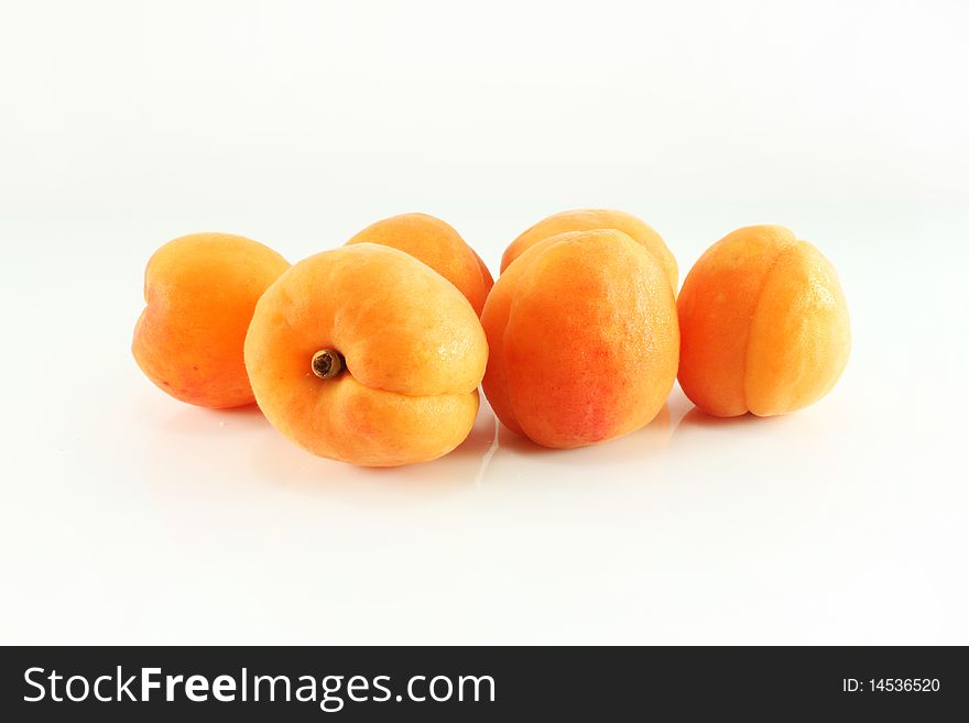 Six of apricots on a white background, isolated, closeup