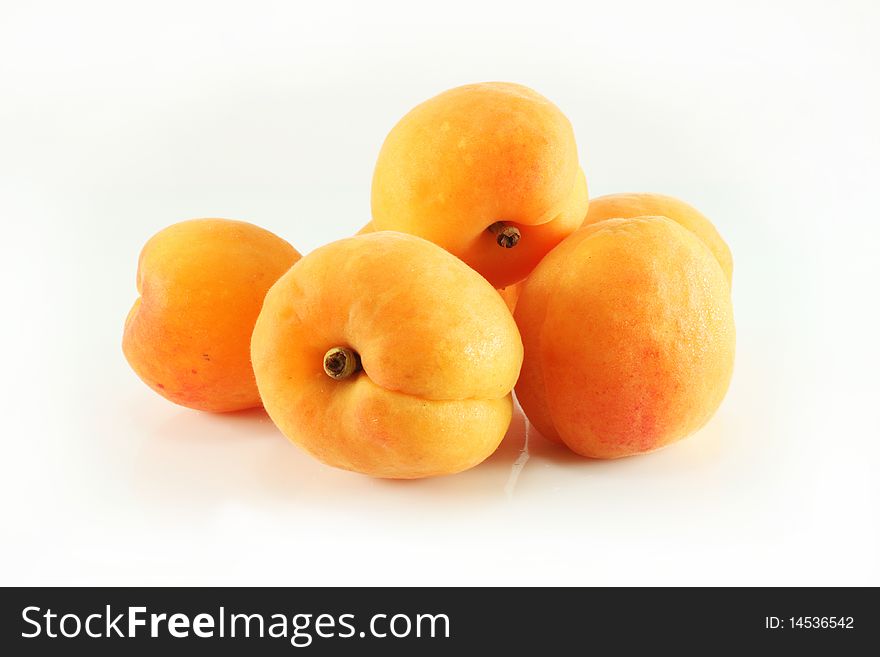 Apricots on a white background, isolated, closeup