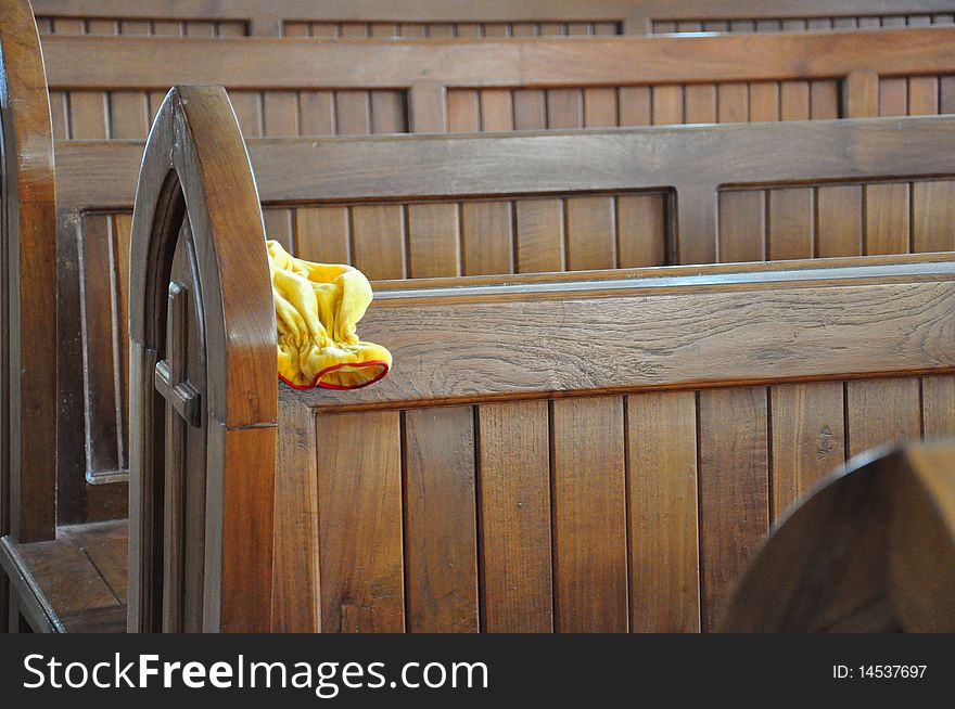 Empty Chairs And Donation Pouch In Church