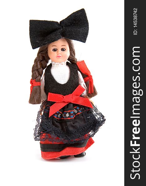 Doll in the French national costume on a white background. Doll in the French national costume on a white background