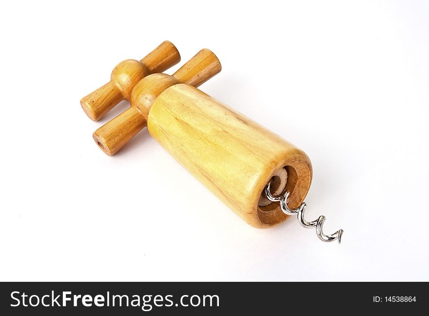 Old wooden corkscrew on white background. Old wooden corkscrew on white background