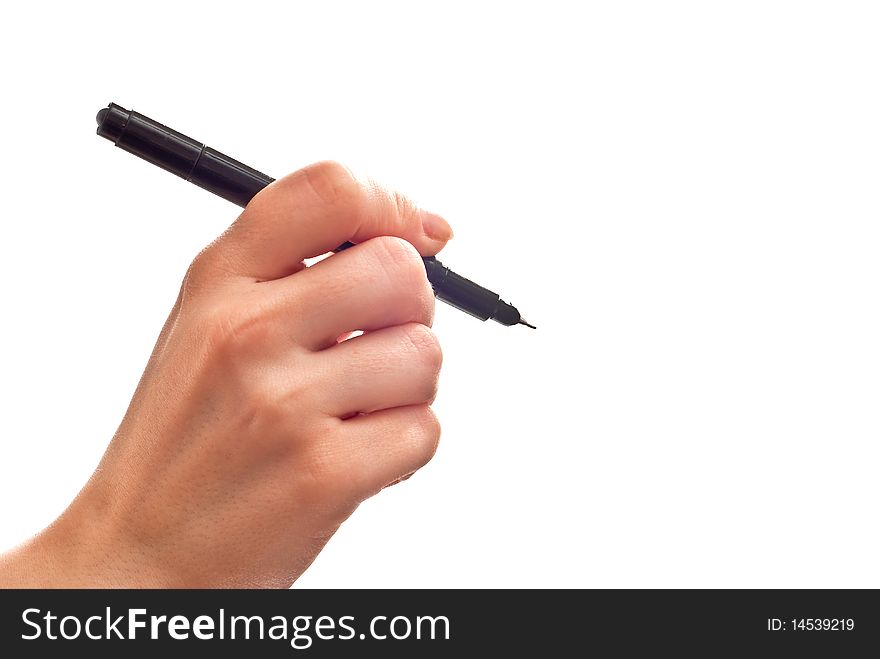 Woman's hand with black pen isolated on white. Woman's hand with black pen isolated on white