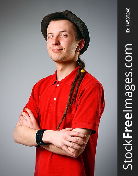 Close-up of a young man in hat