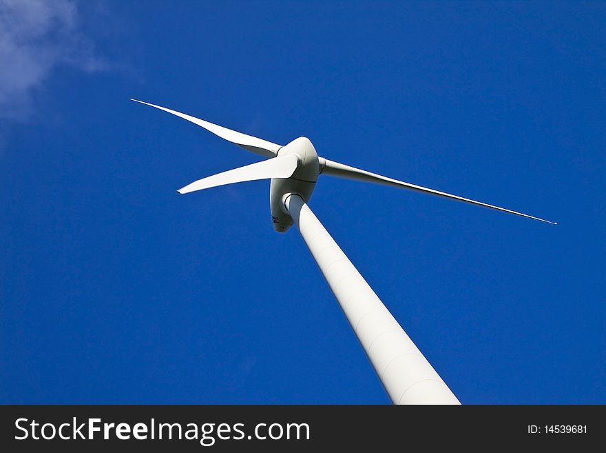 Windmill against a blue sky