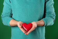 Free Man Holding Decorative Heart On Color Background Royalty Free Stock Photos - 145310818