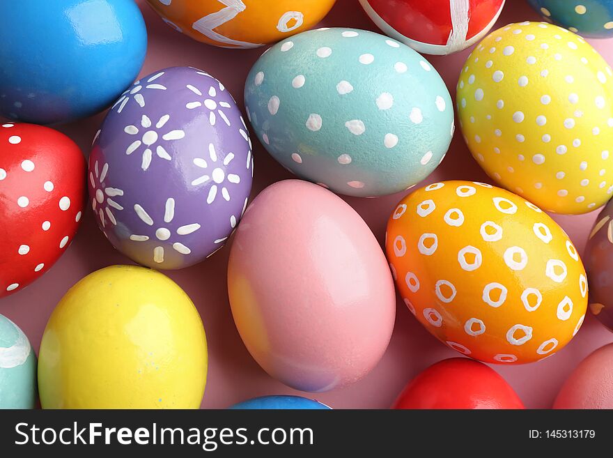 Many colorful painted Easter eggs as background, top view