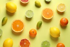 Different Citrus Fruits On Color Background Stock Photography