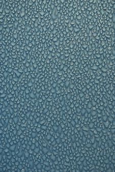 Dew Drops On Blue Metallic Surface Royalty Free Stock Photo Dew Drops On Blue Metallic Surface Royalty Free Stock Photo